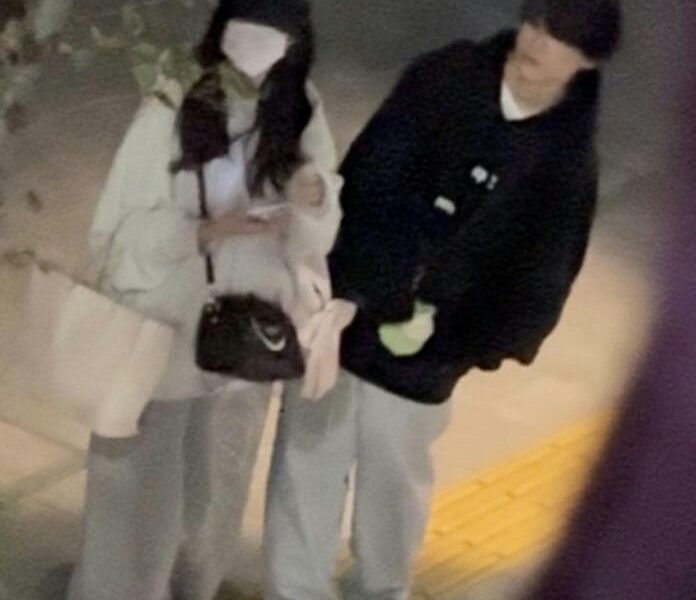 people-two people-outdoor-night-casual wear-sweatpants-hats