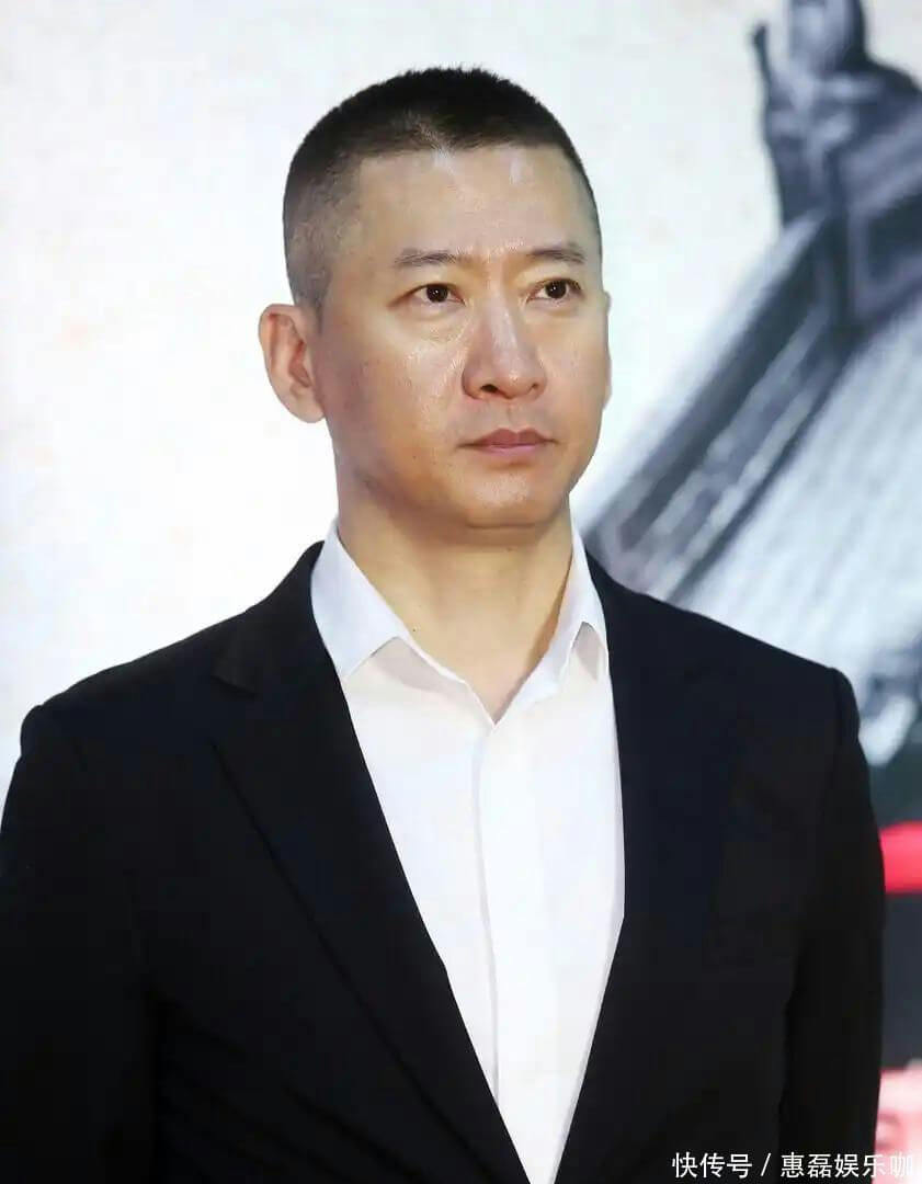 people-man-A-buzz cut hairstyle-A-black suit jacket-A-white collared shirt