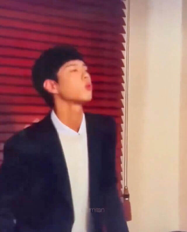 people-young man-A-dark suit-B-white shirt-C-pursed lips