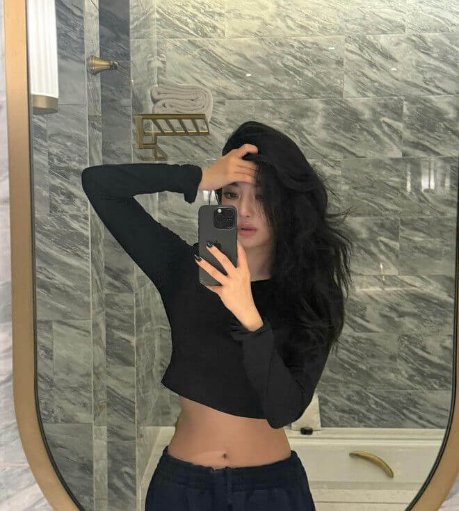 people-woman-A-selfie-A-black top-B-long dark hair-C