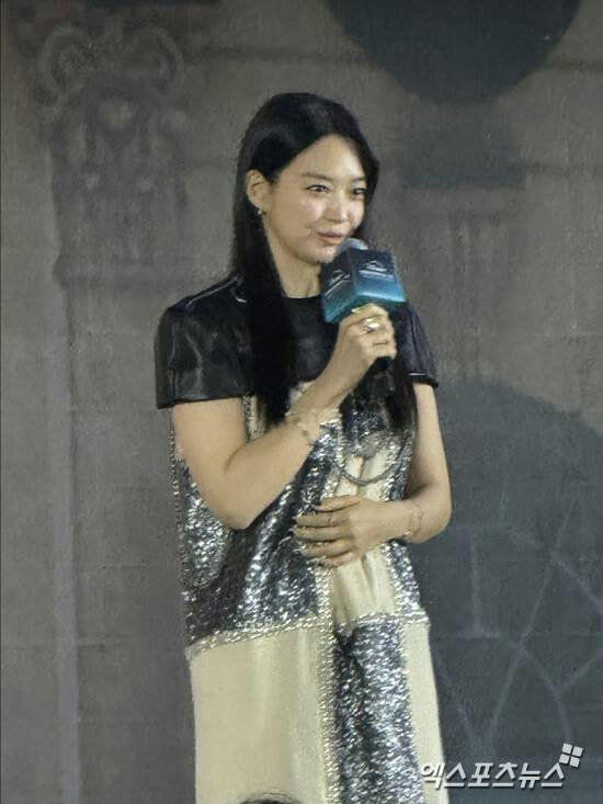 people-A-Shin Min-a-A-holding microphone-A-sequined top-A-black leather sleeves