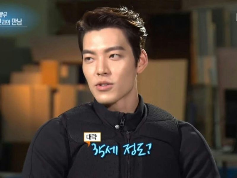 people-A-Kim Woo-bin-A-Korean actor-B-interview setting-C-Korean text overlays