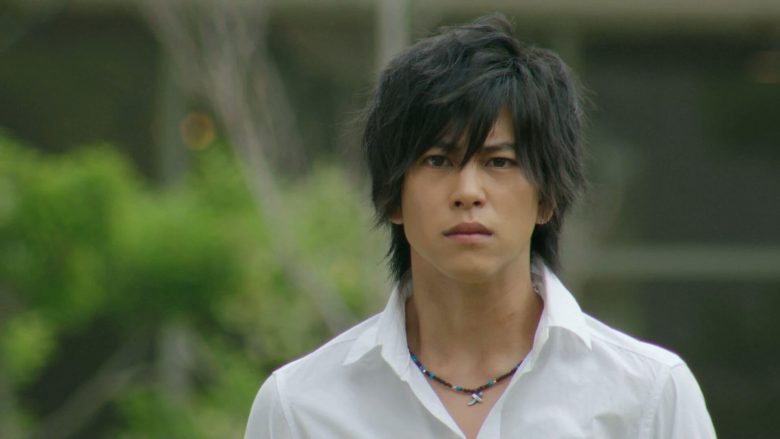 people-man-A-dark hair-A-white collared shirt-A-necklace with cross pendant