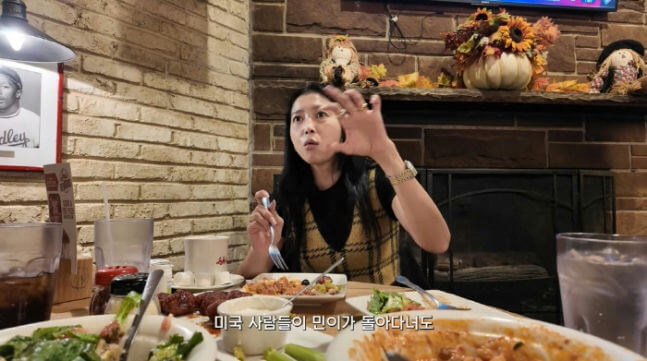 people-1-woman-A-eating-A-gesture-A-indoor-A-restaurant-A-fireplace