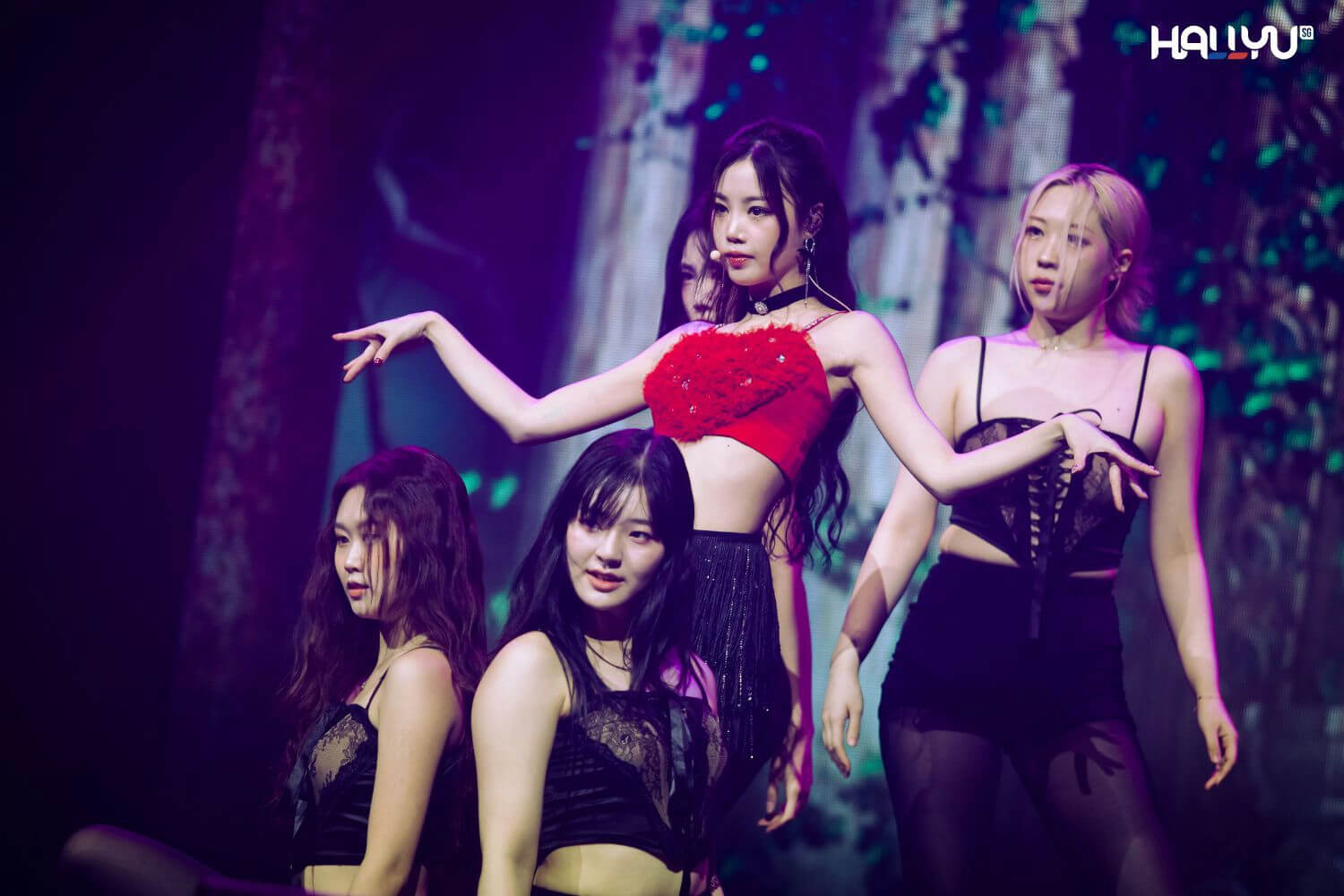 people-five women-A-performance-A-stage-A-K-pop-A-dance-A-red crop top-A-black lace tops-A-dark setting