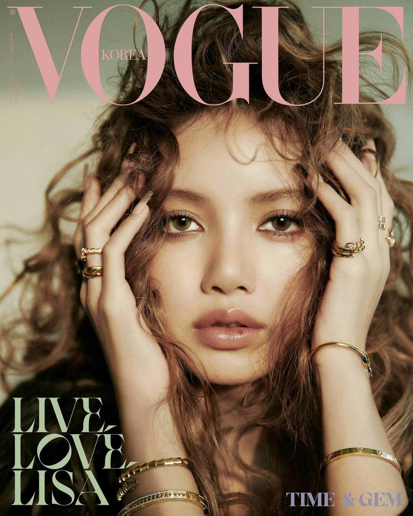 people-Lisa (BLACKPINK)-magazine cover-Vogue Korea-jewelry-gold rings and bracelets-wavy brown hair-glossy lips