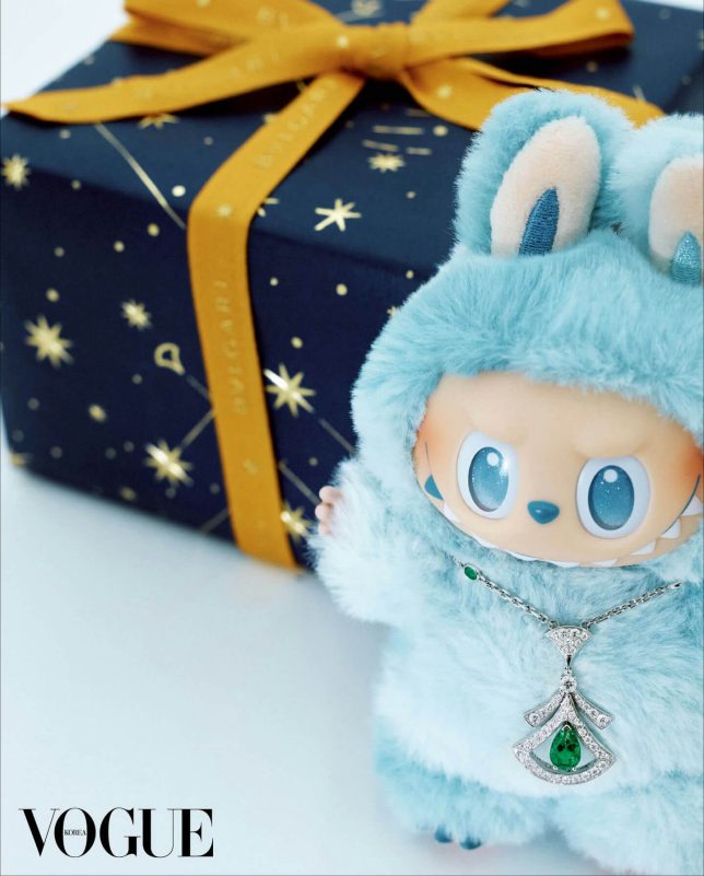 toys-A-fluffy blue creature-A-Bulgari gift box-A-diamond and emerald necklace-A-Vogue Korea logo