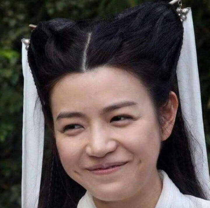 people-Asian woman-A-smiling awkwardly-B-historical costume-C-prominent dimples