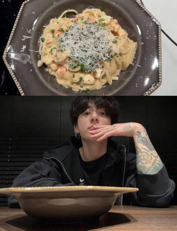 people-Jungkook (BTS)-A-pasta-A-seafood pasta-A-creamy sauce-B-black hoodie-B-tattoos-C-dining-C-indoors