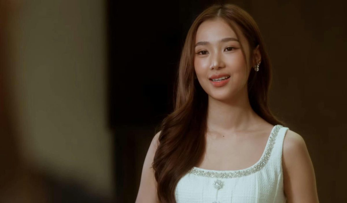 people-Young woman-A-smiling-A-brown hair-A-white dress-A-jeweled neckline