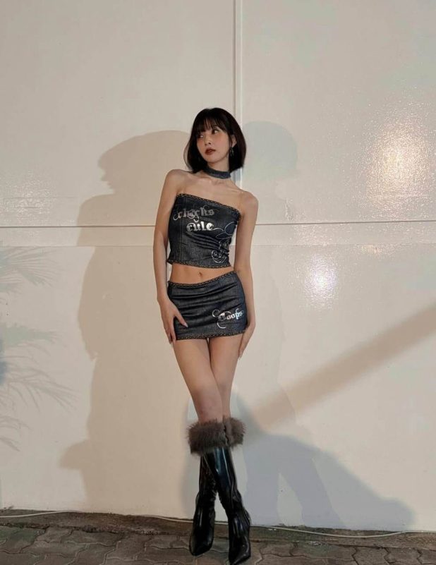 people-1-woman-A-short black hair-B-denim tube top-C-fur-trimmed boots