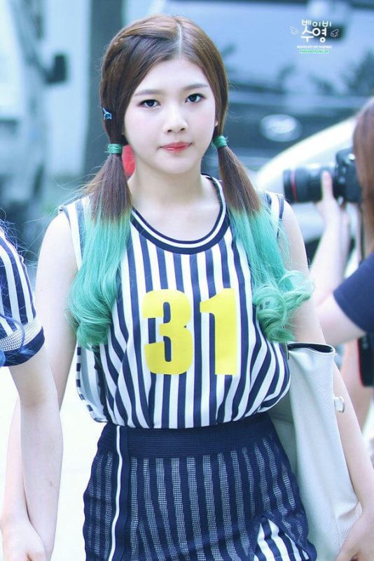 people-Joy from Red Velvet-A-pigtails-A-ombre hair (green tips)-B-striped tank top-B-yellow number 31-C-outdoor setting