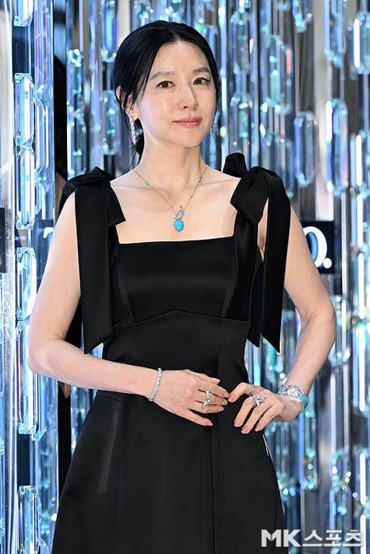 people-Woman-Black Dress-Turquoise Necklace-Jewelry-Formal Event