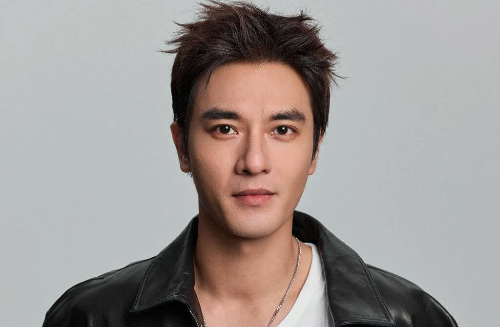 people-Male Actor-A-Black Leather Jacket-A-Spiky Dark Hair-B-Silver Necklace-C-Studio Portrait