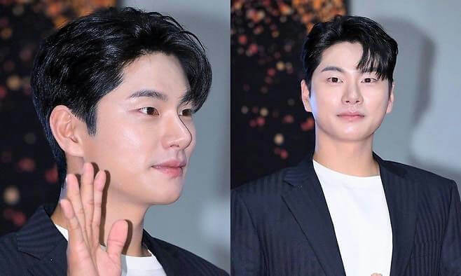 people-one male-A-Korean celebrity-A-black hair-A-dark pinstripe suit-A-white t-shirt
