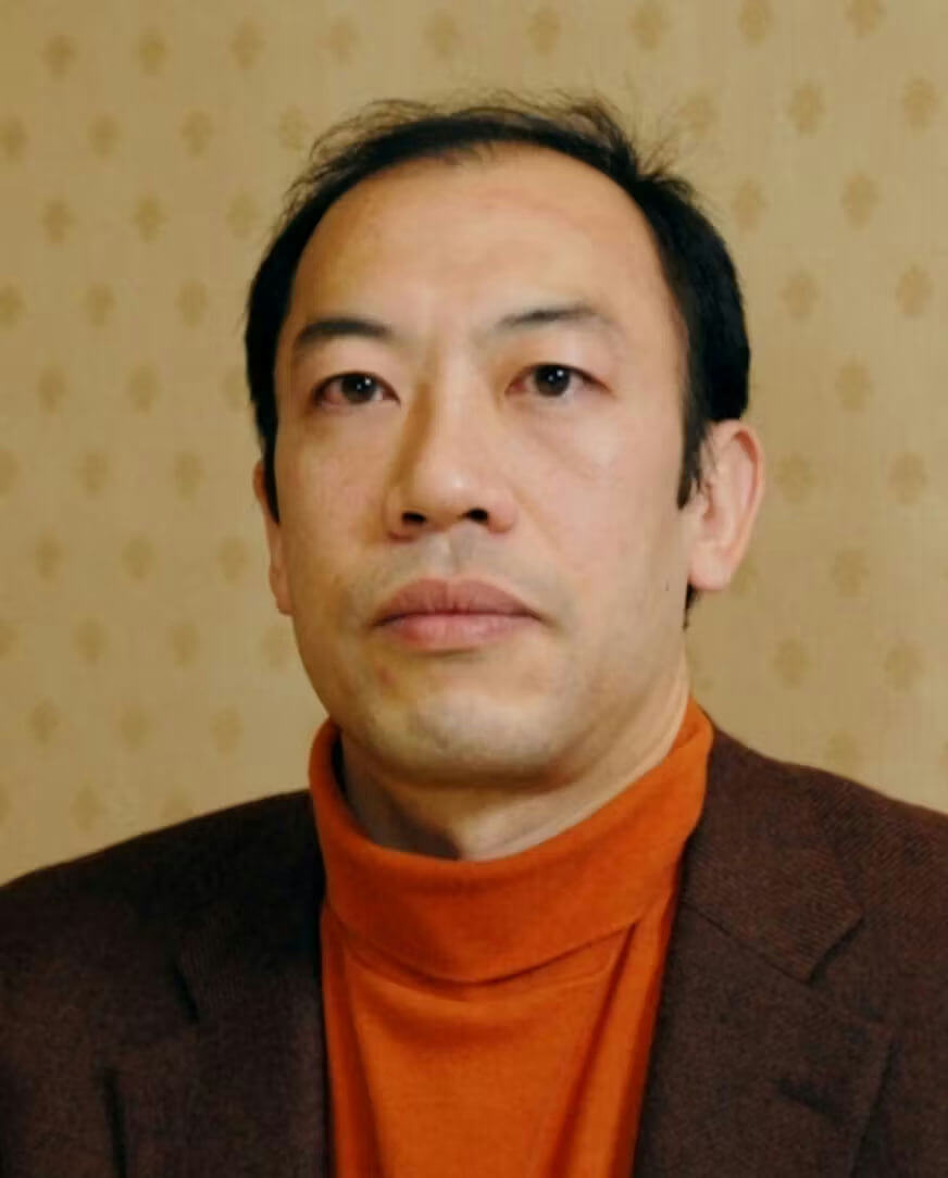people-man-Asian-A-turtleneck-A-orange-A-jacket-A-brown