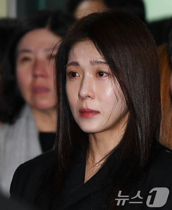 people-woman-close-up-face-sadness-tears-dark-hair-black-clothing