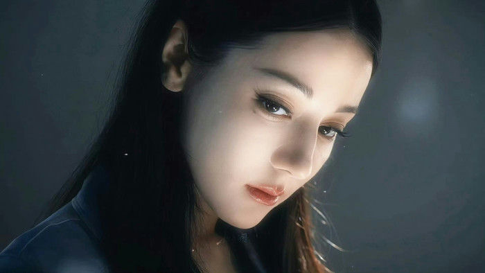 people-female-close-up-dark-lighting-dramatic-gaze