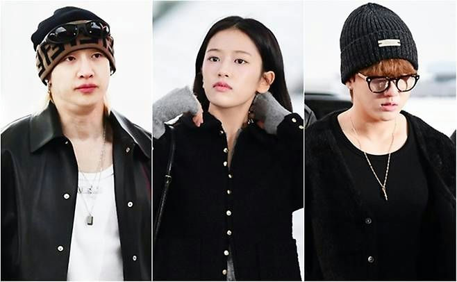 people-three people-female-male-male-airport fashion-Fendi beanie-black outerwear-gray gloves