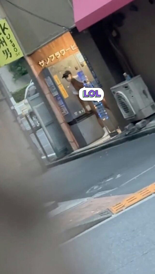 people-1-person-A-vending-machine-A-street-A-LOL-sticker