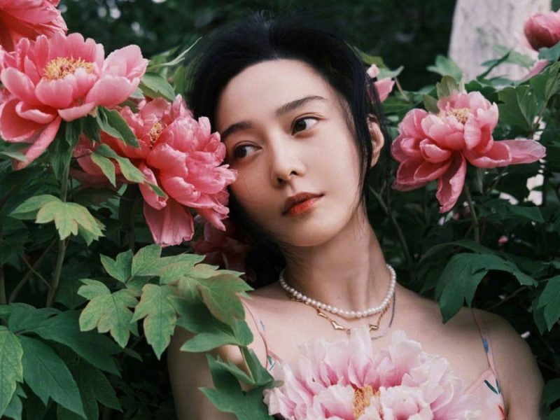 people-woman-A-peony flowers-B-pearl necklace-C-lush greenery