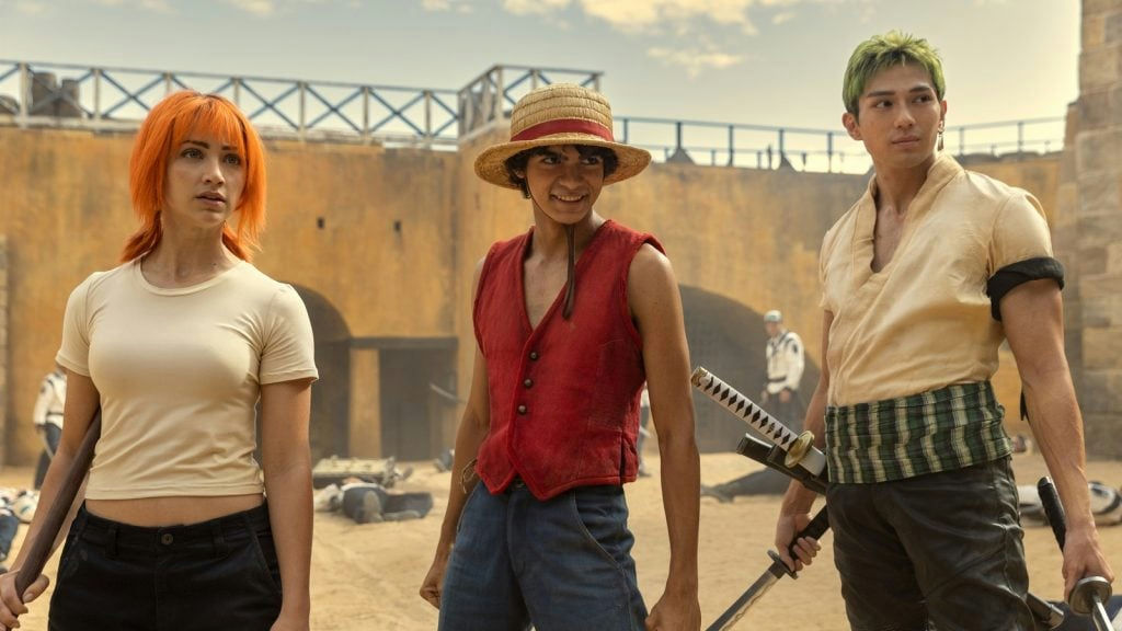 people-Three-actors-A-Netflix-live-action-One-Piece-costumes-A-orange-haired-woman-A-straw-hat-wearing-boy-A-green-haired-swordsman
