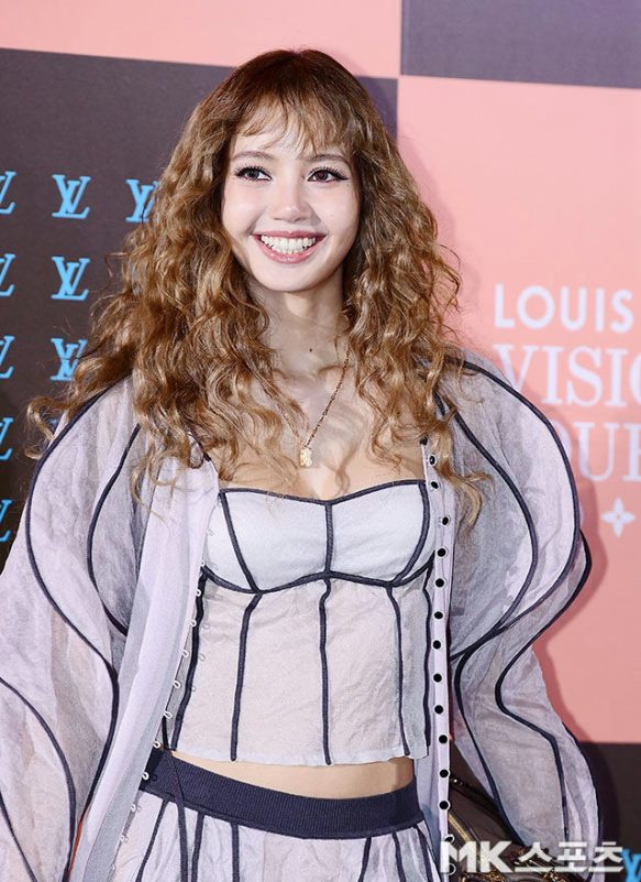 people-Lisa (BLACKPINK)-smiling-curly blonde hair-Louis Vuitton event-sheer top with dark piping