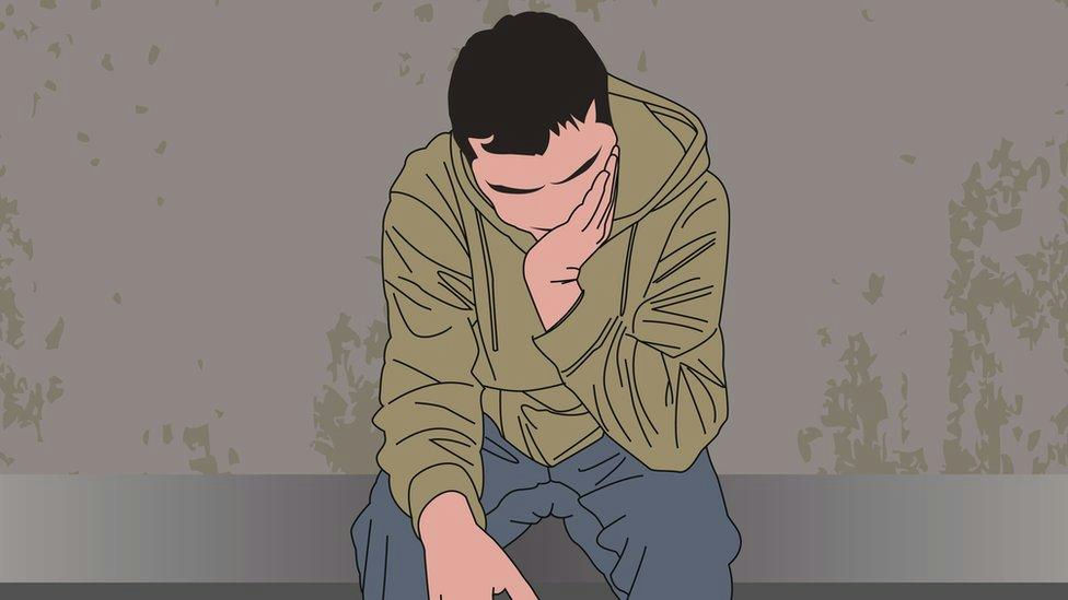 people-1-sadness-A-man-A-hoodie-A-distressed-B-sitting-B-pensive-C-illustration-C