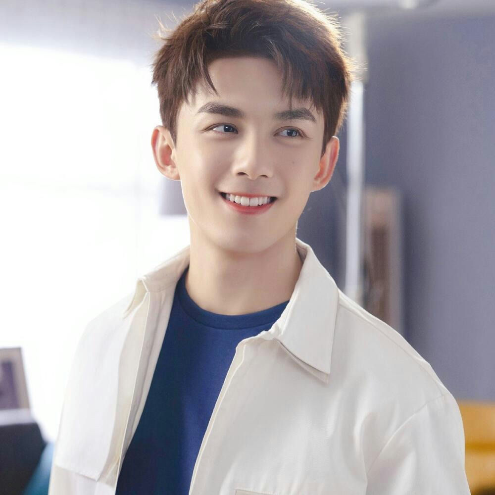 people-young man-A-smiling-B-brown hair-C-white jacket-D-blue shirt