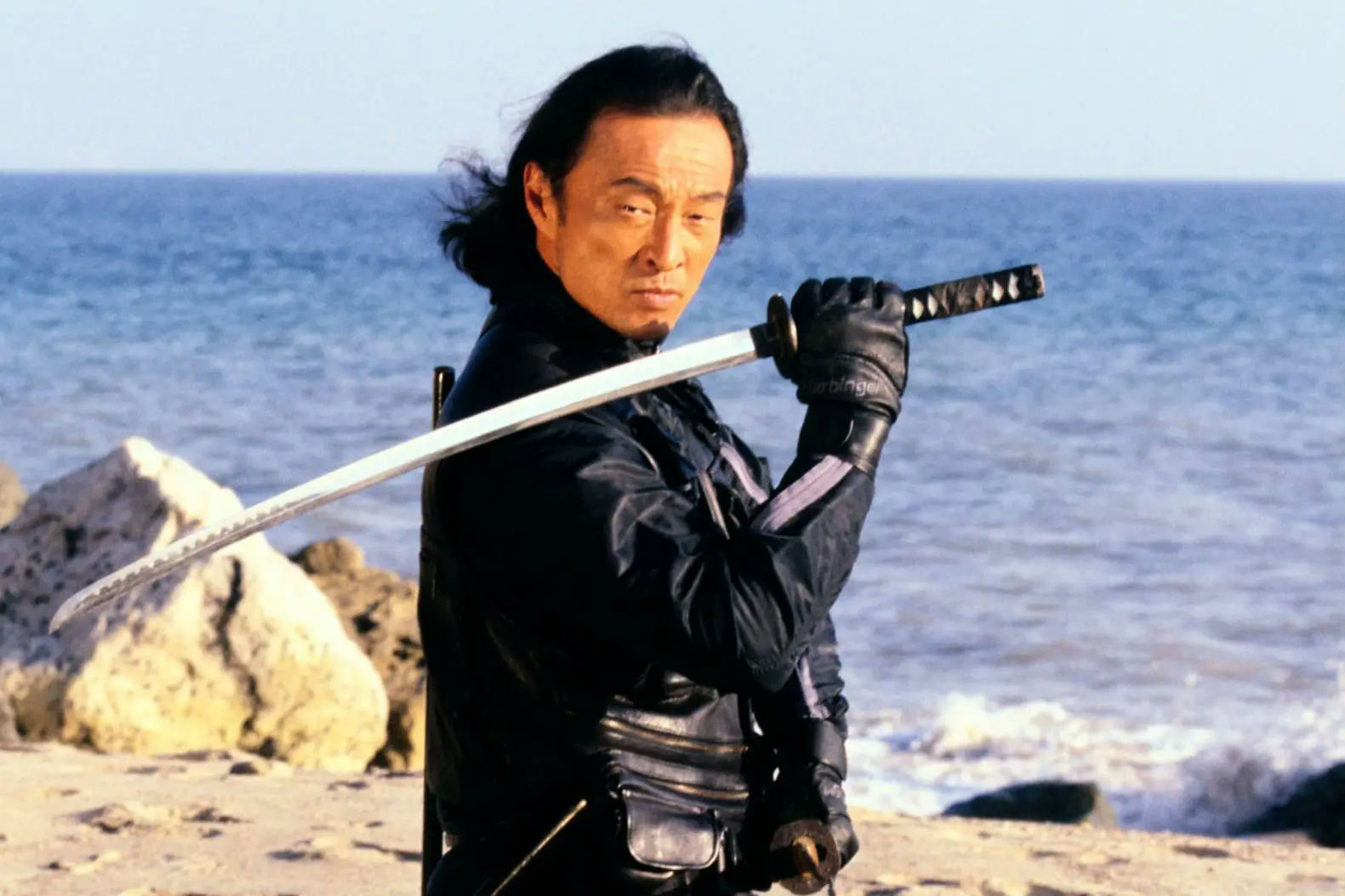 people-Cary-Hiroyuki-Tagawa-A-sword-A-beach-A-ninja-like-attire