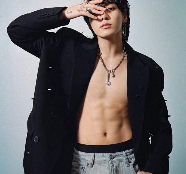 people-Man-A-bare-chested-A-black-blazer-A-ripped-jeans-A-spiky-hair