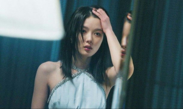 people-1-woman-A-dark hair-A-light blue halter top-A-looking at viewer