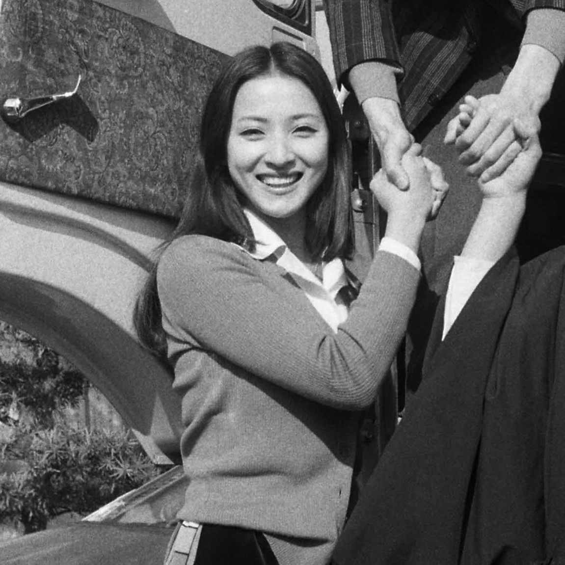 people-woman-smiling-A-handshake-A-vintage-A-Asian-A-cardigan