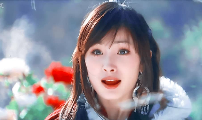 people-woman-A-long dark hair-A-large silver earrings-A-open mouth expression-A-outdoor scenery