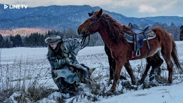 people-1-person in winter fur attire-A-horse-A-snowy landscape-B-LINE TV logo-C