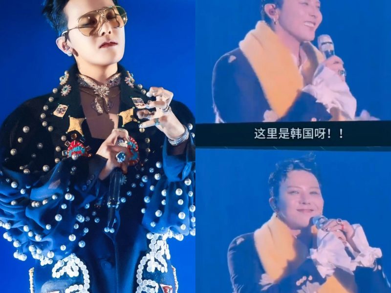 people-G-Dragon-A-concert-A-blue-background-A-pearl-embellished-jacket-A-sunglasses-A-Chinese-subtitles
