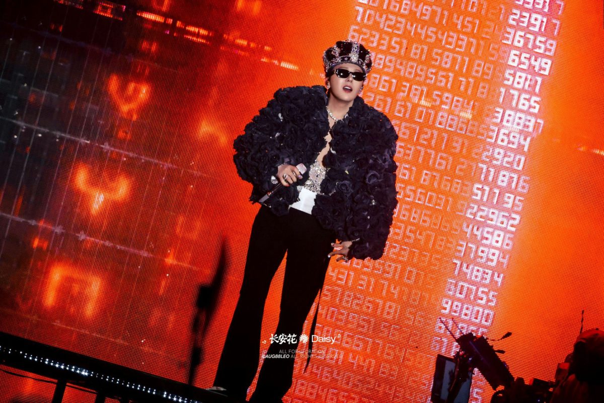 people-G-Dragon-A-performance-A-crown-A-black-rose-jacket-A-sunglasses-A-stage-A-red-LED-screen