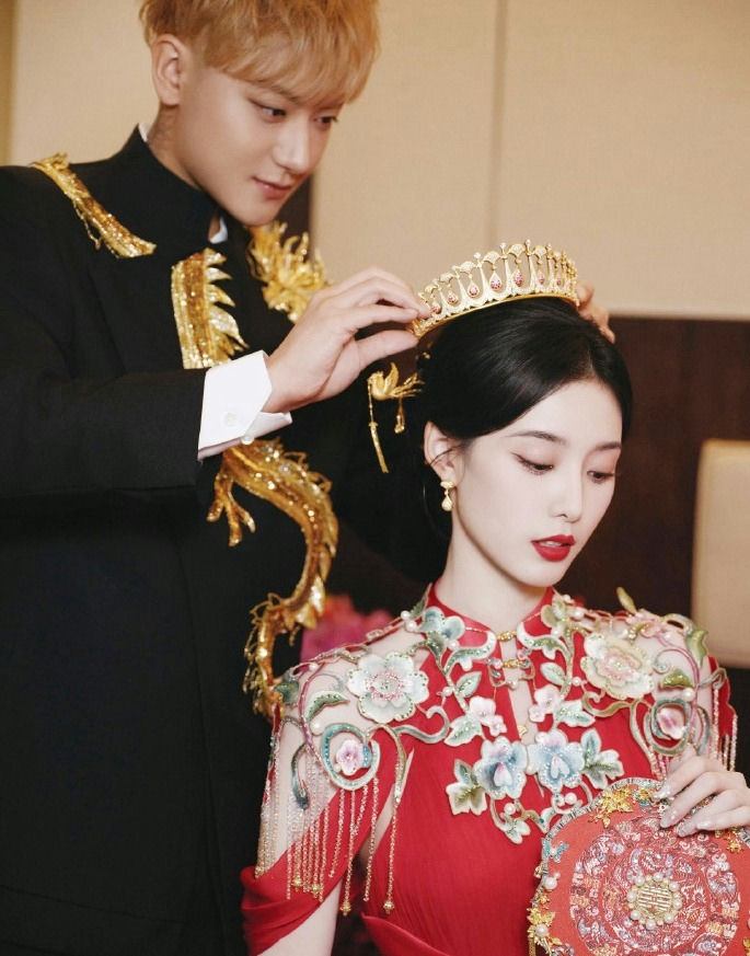 people-man-placing-crown-on-woman-woman-wearing-red-dress-and-crown-crown-gold-and-jeweled