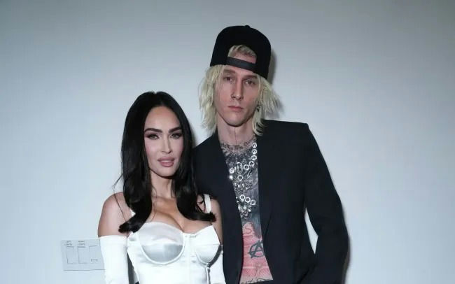 people-Megan Fox and Machine Gun Kelly-A-couple-A-red carpet event-C-white corset top and black suit