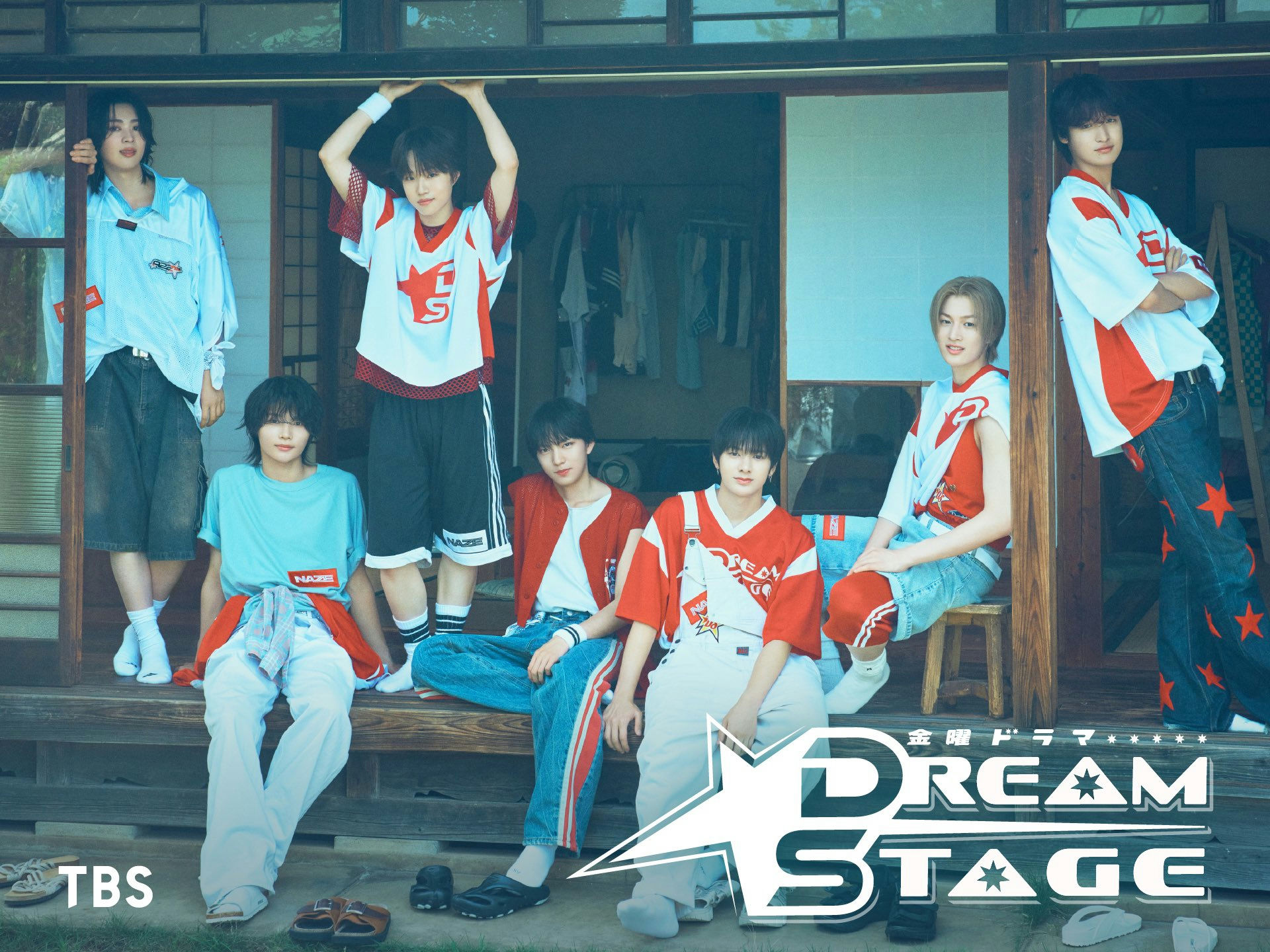 people-seven young men-A-casual sportswear-A-Japanese traditional building setting-B-red and white/light blue color scheme-C-promotional image for