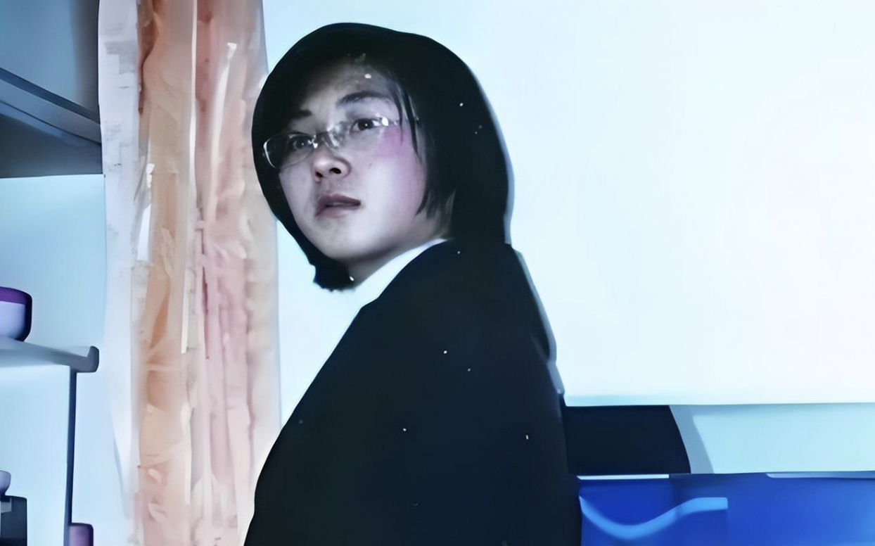 people-woman-glasses-suit-indoor-pink cheeks