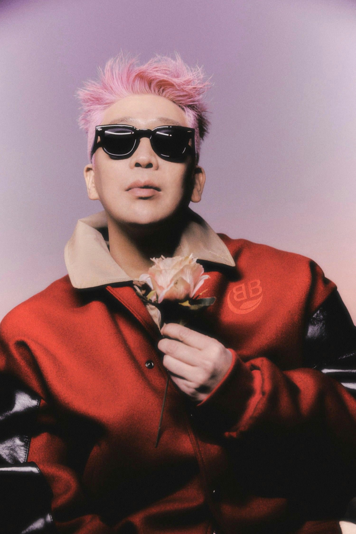 people-1-pink hair-A-sunglasses-A-red jacket-A-holding flower-A-Balenciaga logo