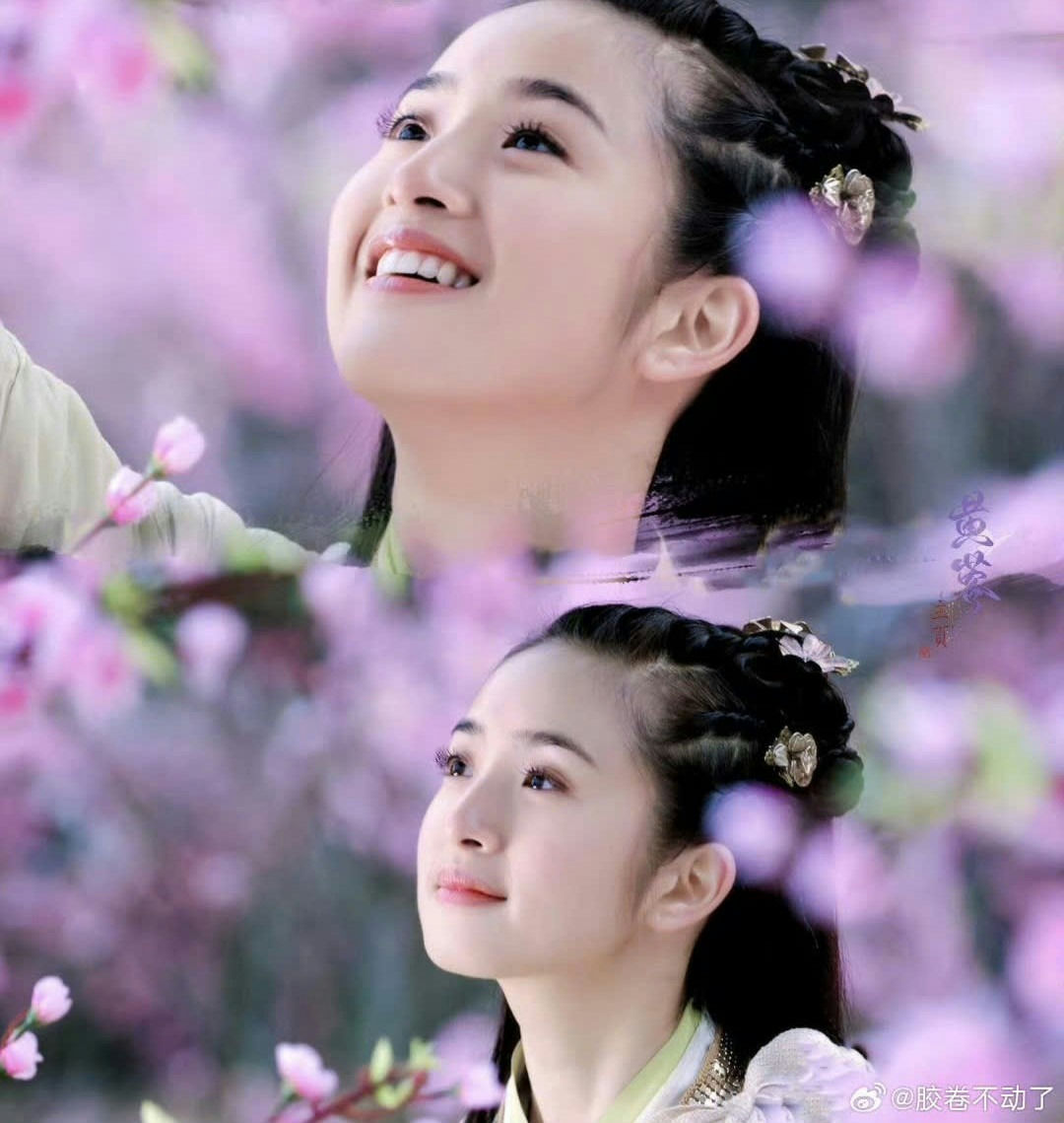 people-Young Woman-A-Smiling-A-Looking Up-A-Surrounded by Pink Blossoms