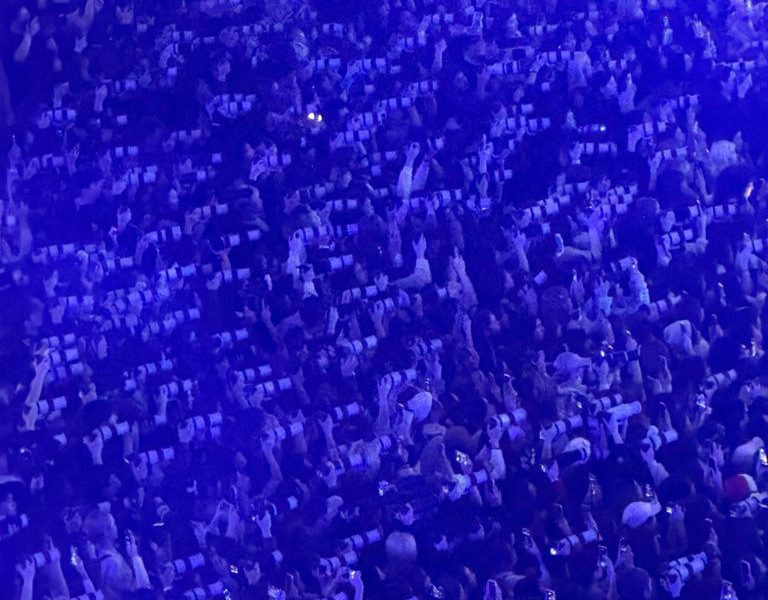 people-crowd-A-cameras-A-blue-lighting-A-concert