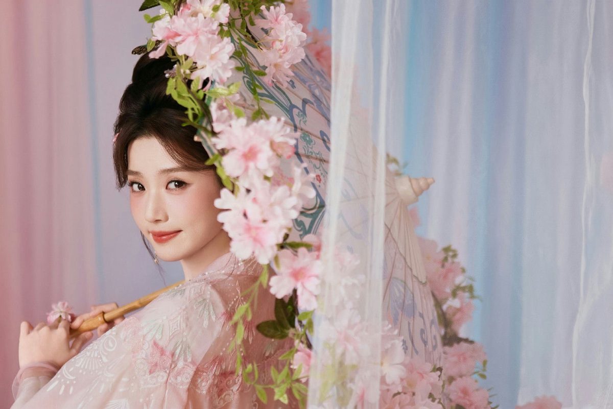 people-Woman-pink attire-Chinese style-cherry blossoms-parasol