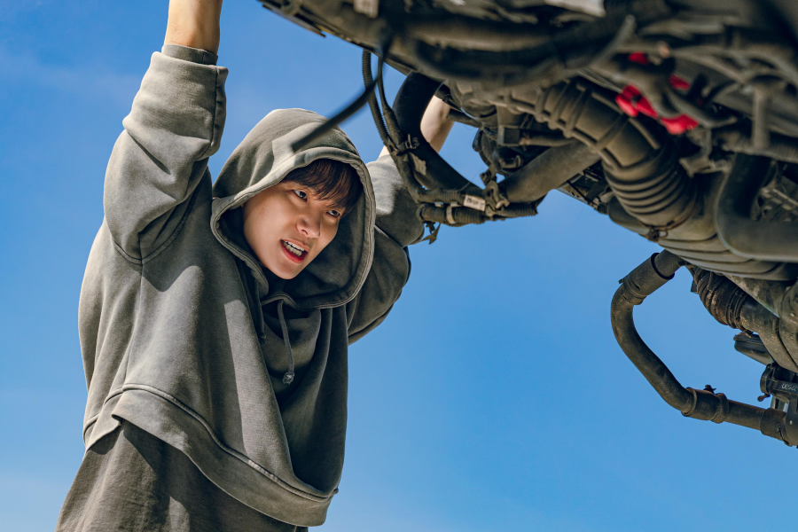 people-Actor-Struggling-A-Car-Mechanic-A-Blue-Sky-A-Hoodie