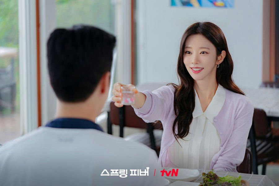 people-Kim Ha-neul-A-smiling-A-offering drink-A-sitting at table-B-tvN logo-C-Springtime with You