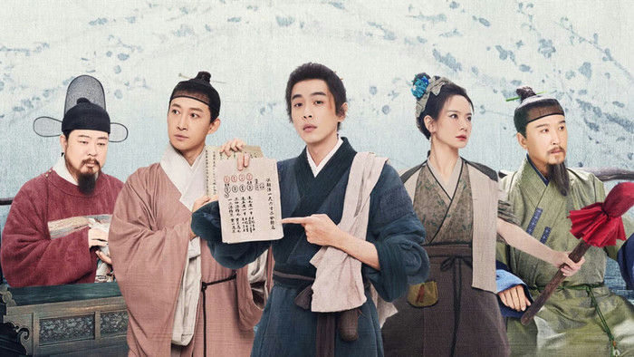 people-Five-actors-in-historical-Chinese-costumes-A-Central-man-in-blue-holding-a-document-and-pointing-at-it-A-woman-in-brown-and-beige-attire-to-the-right-of-the-center-man-Two-men-in-traditional-official-robes-one-with-a-long-beard-and-distinctive-hat-and-another-in-pink-A-man-on-the-far-right-in-green-holding-a-staff-with-a-red-tassel-A-light-blue-and-white-painterly-background