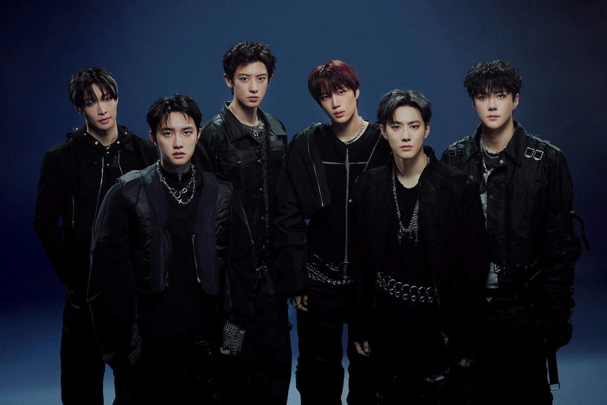 people-EXO-K-pop group-A-black outfits-A-dark blue background-A-chains and buckles-B-formal pose-B-male idols-C