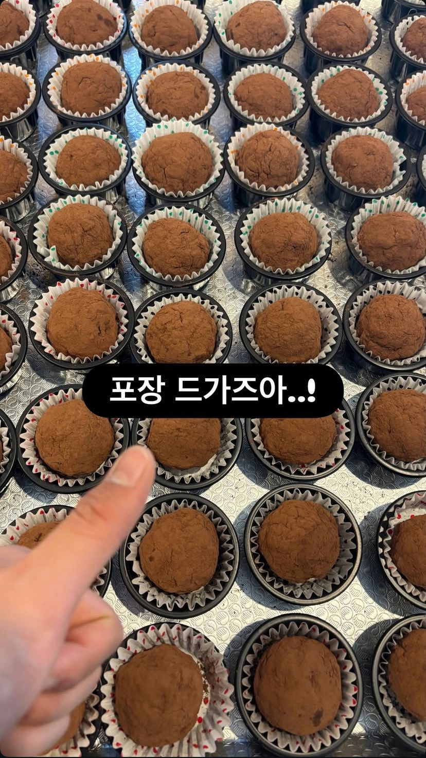 people-A-hand-A-pointing-A-chocolate-truffles-B-cocoa-powder-C-baking-tray